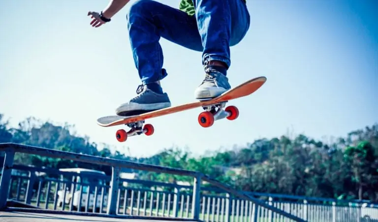 Man riding on a complete skateboard build
